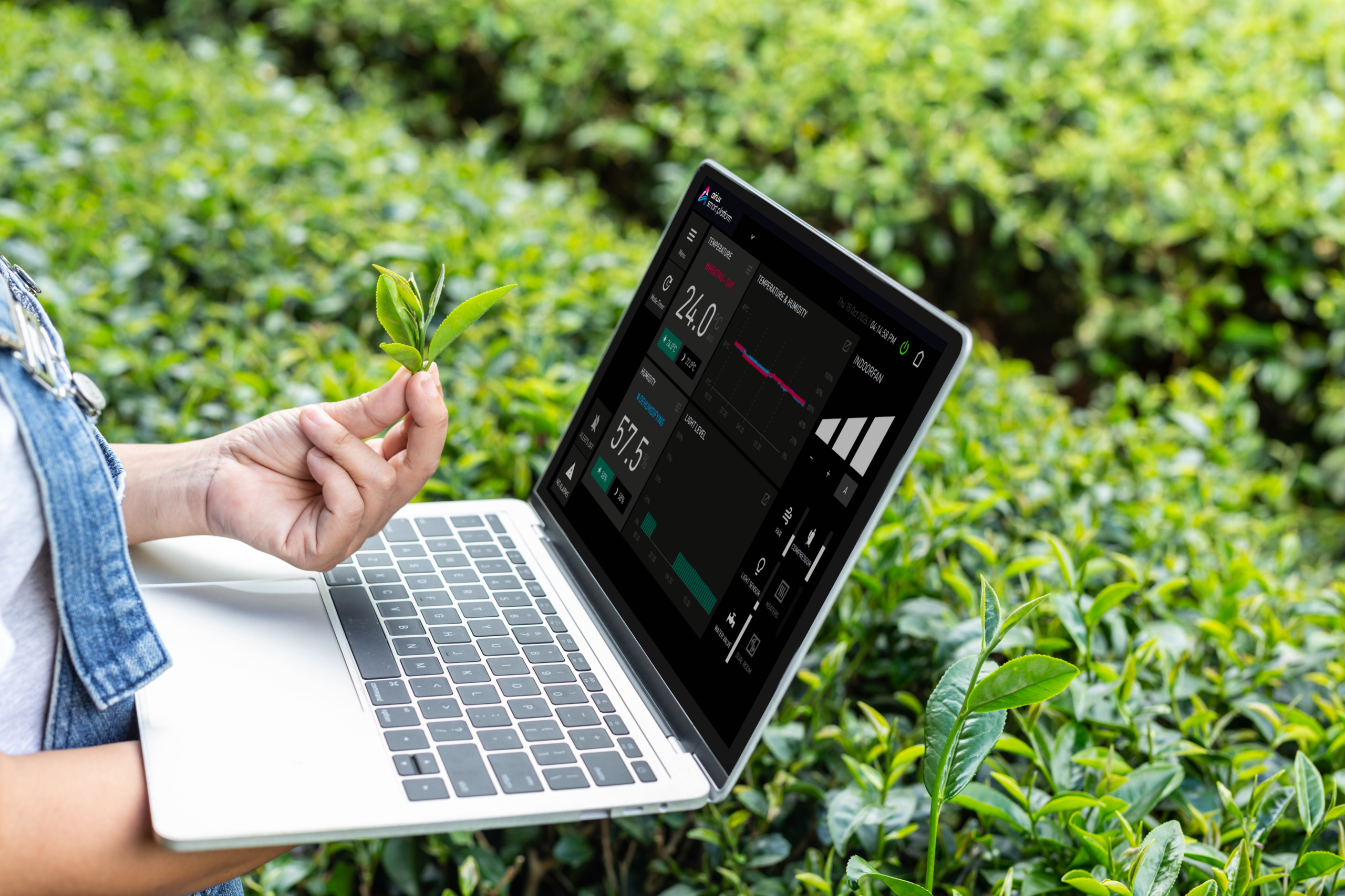 Laptop showing the Airlux control dashboard for monitoring a growing environment